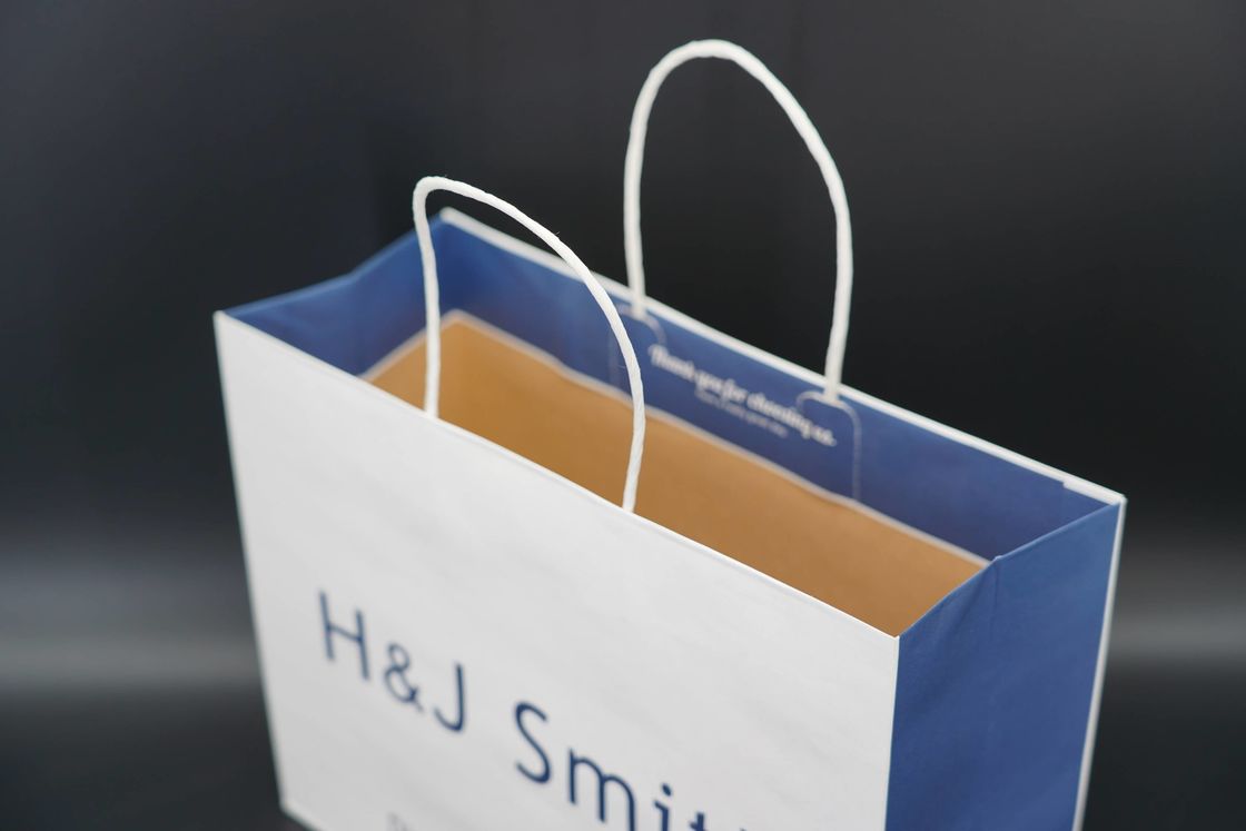 Luxury Coated Eco Paper Bags Packaging Biodegradable With Twisted Paper Handles